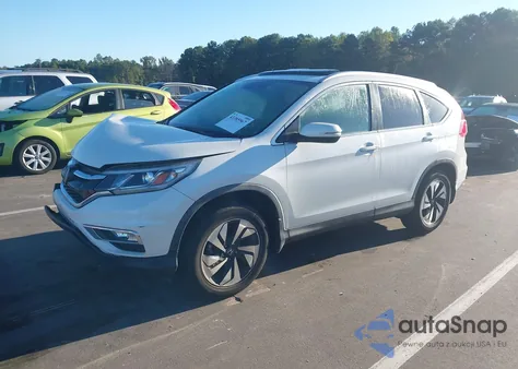 2015 Honda Cr-V Touring from USA, damaged, VIN 5J6RM4H93FL131382